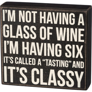 box sign glass of wine classy